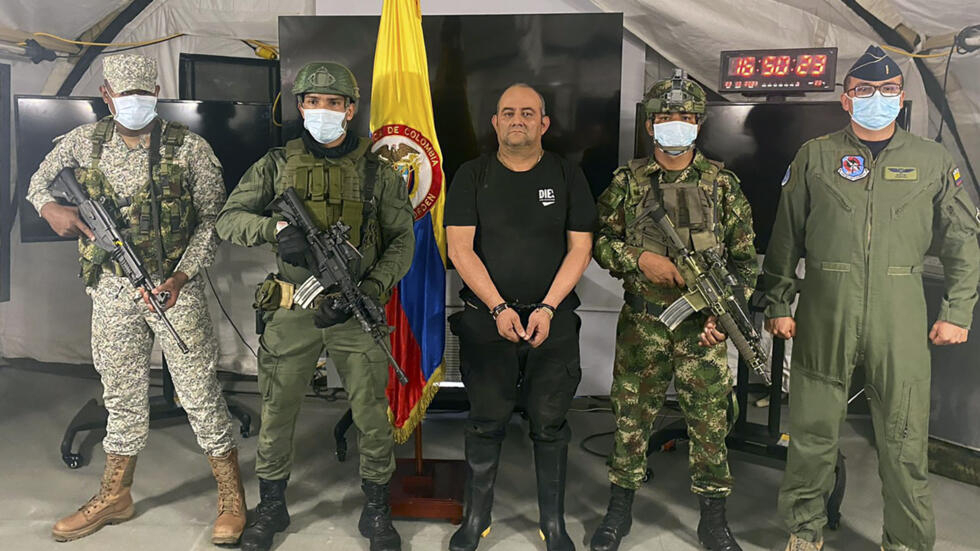 In this photo released by the Colombian presidential press office, one of the country's most wanted drug traffickers, Dairo Antonio Usuga, alias "Otoniel," is presented to the media at a military base in Necocli, Colombia on October 23, 2021.
