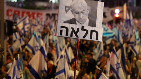 Thousands of Israelis protest after government pushes through key reform