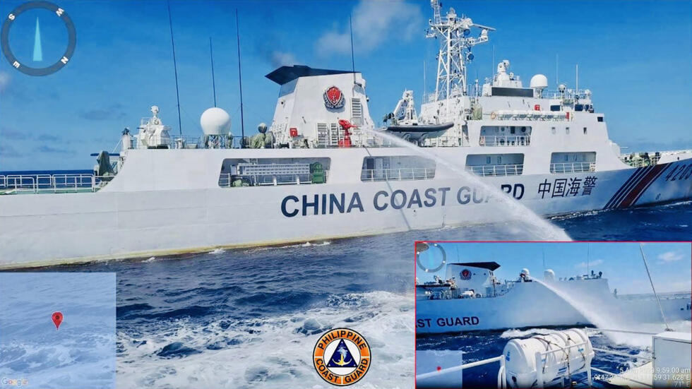 The Philippines has accused China Coast Guard vessels of firing water cannons at its ships in the disputed South China Sea.