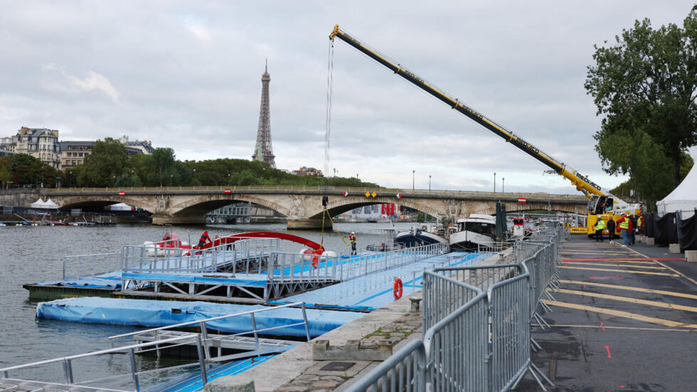 General view of the Seine River and Eiffel Tower as the swimming competition in the lead up to the 2024 Summer Olympics is cancelled.